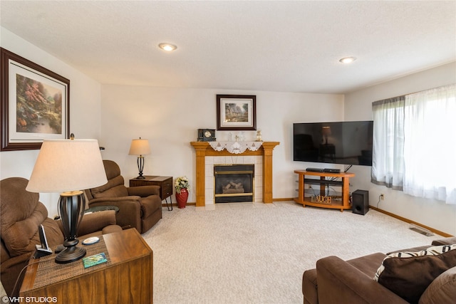 9601 NE 28th Ct, Ankeny, IA 50021 - living room with a fireplace, carpet floors, baseboards, and recessed lighting