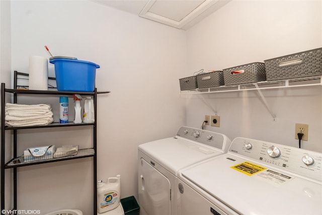 9601 NE 28th Ct, Ankeny, IA 50021 - laundry room featuring attic access, laundry area, and independent washer and dryer