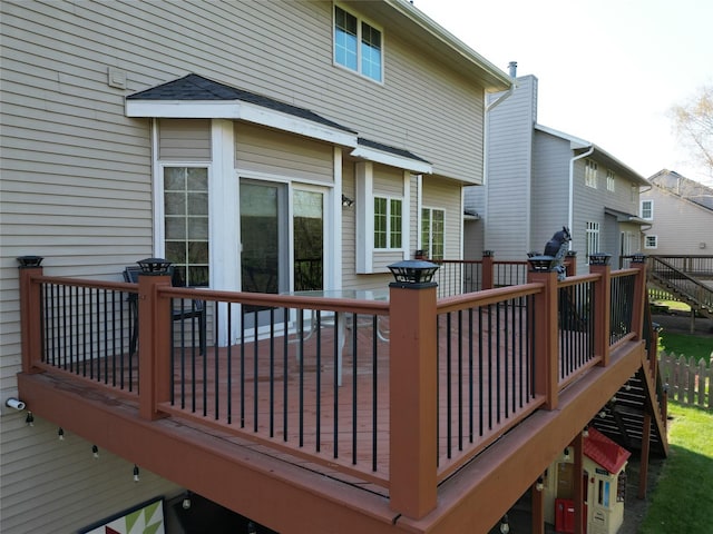 wooden terrace featuring stairway