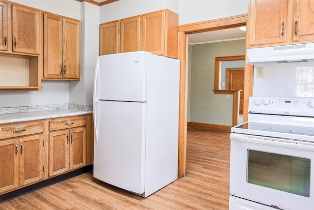 kitchen featuring under cabinet range hood, light countertops, ornamental molding, white appliances, and light wood-type flooring