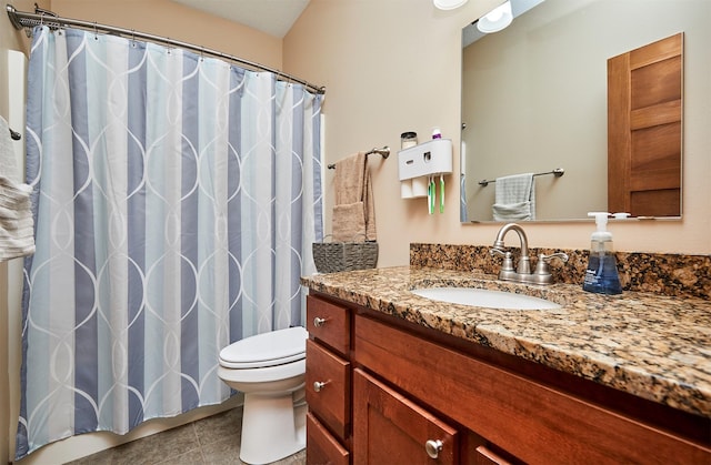 full bathroom featuring curtained shower, toilet, vanity, and tile patterned floors