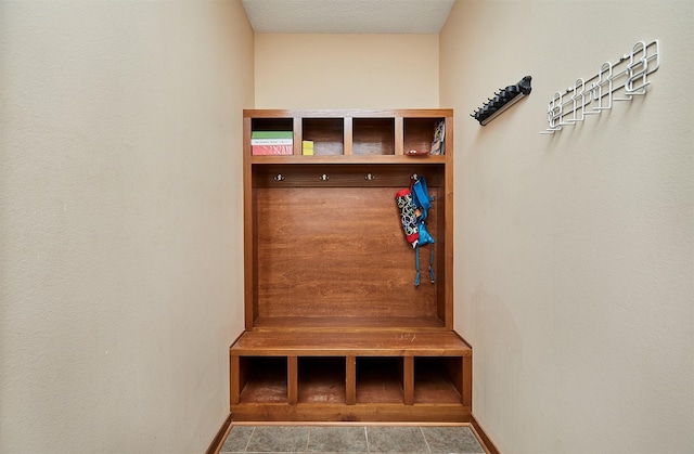 mudroom featuring baseboards
