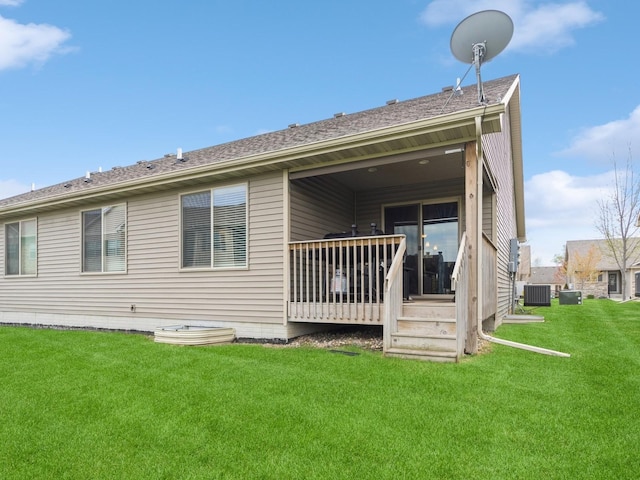 1110 NE 15th Ln, Ankeny, IA 50021 - back of house with a yard, central AC, and a deck
