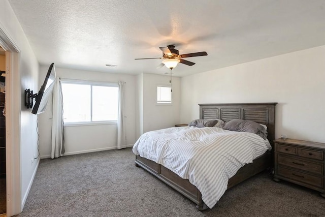 717 37th St SW, Bondurant, IA 50035 - bedroom with baseboards, a ceiling fan, and carpet