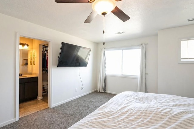 717 37th St SW, Bondurant, IA 50035 - carpeted bedroom with visible vents, baseboards, and multiple windows