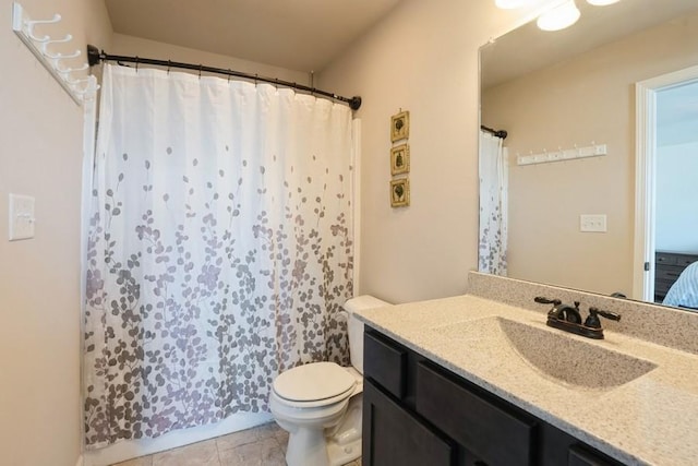 717 37th St SW, Bondurant, IA 50035 - full bathroom featuring toilet, a shower with curtain, vanity, and tile patterned floors