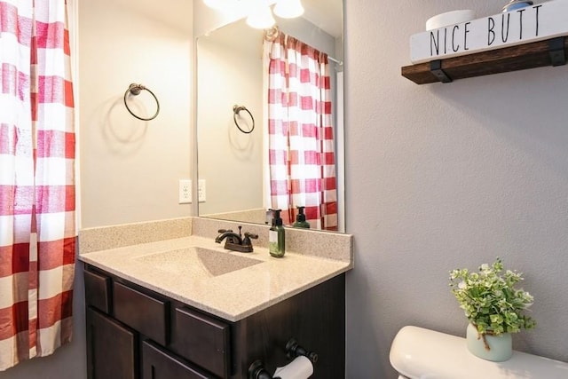 717 37th St SW, Bondurant, IA 50035 - bathroom featuring vanity and toilet
