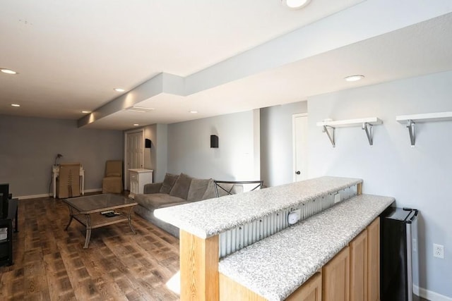 717 37th St SW, Bondurant, IA 50035 - living room with recessed lighting, baseboards, and dark wood-style floors