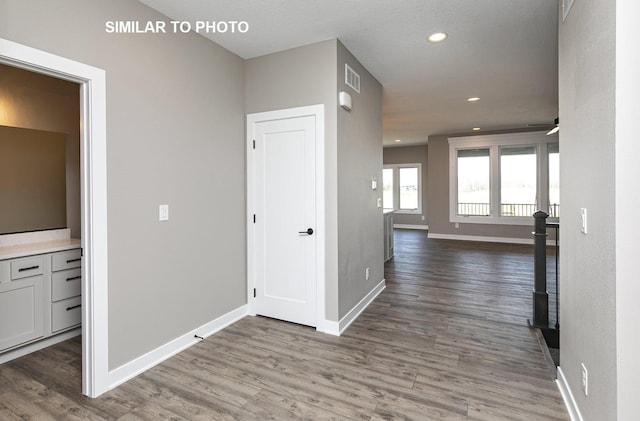530 Walnut Dr, Huxley, IA 50124 - hall with wood finished floors and recessed lighting