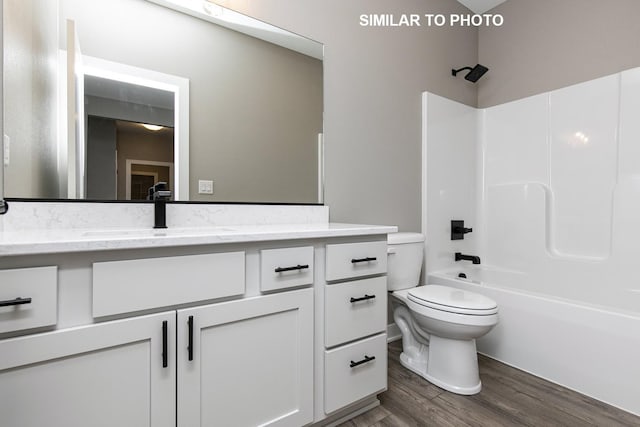 530 Walnut Dr, Huxley, IA 50124 - full bath with vanity, shower / washtub combination, and wood finished floors