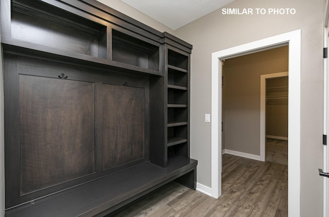 530 Walnut Dr, Huxley, IA 50124 - mudroom featuring wood finished floors and baseboards