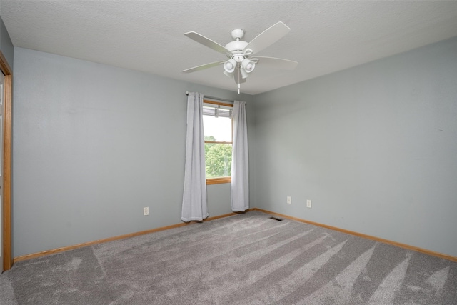748 76th St, West Des Moines, IA 50266 - carpeted empty room featuring ceiling fan, baseboards, and a textured ceiling