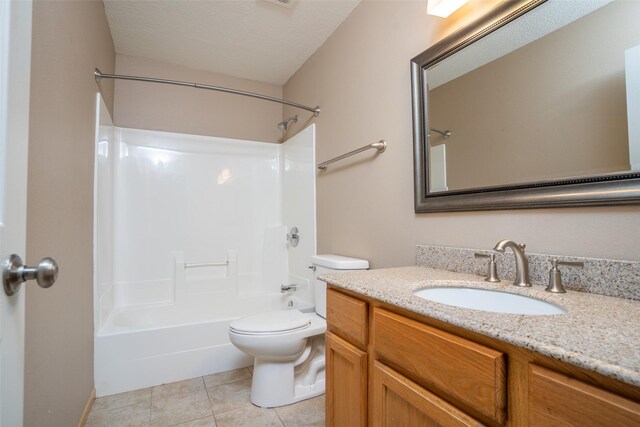 748 76th St, West Des Moines, IA 50266 - bathroom with vanity, toilet, tub / shower combination, and tile patterned flooring