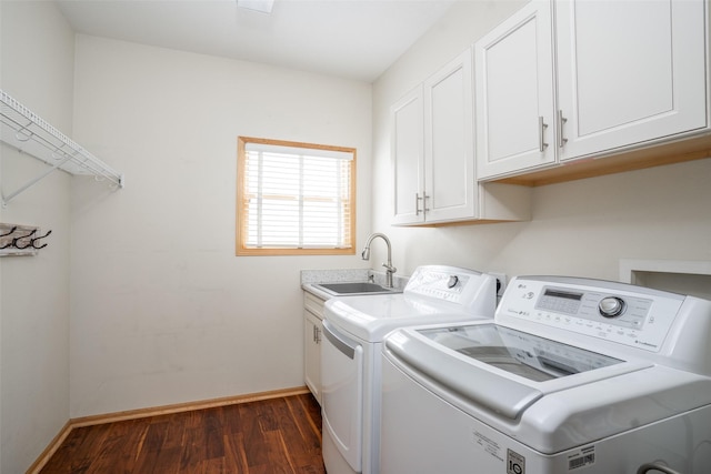 748 76th St, West Des Moines, IA 50266 - washroom featuring separate washer and dryer, dark wood finished floors, cabinet space, and baseboards