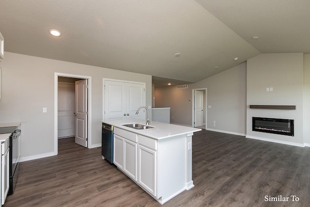 kitchen featuring dishwashing machine, white cabinetry, dark wood-style flooring, and a sink