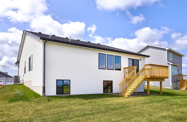 635 NW Compass Ave, Waukee, IA 50263 - rear view of property with stairway, a deck, and a yard