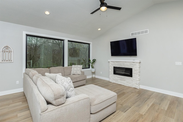 1040 W Trace Pl, Polk City, IA 50226 - living area featuring recessed lighting, visible vents, a ceiling fan, baseboards, and a fireplace