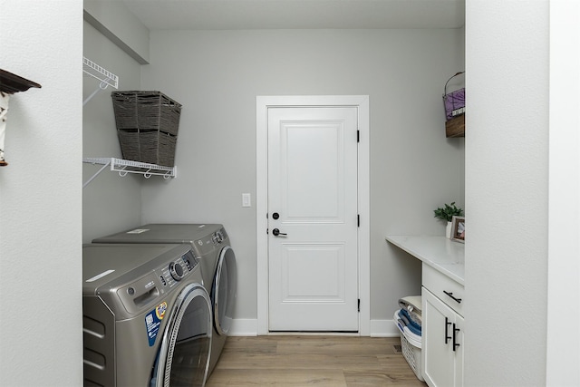 1040 W Trace Pl, Polk City, IA 50226 - laundry room featuring baseboards, light wood finished floors, laundry area, and washer and clothes dryer