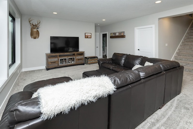 1040 W Trace Pl, Polk City, IA 50226 - carpeted living area with stairway, baseboards, and recessed lighting