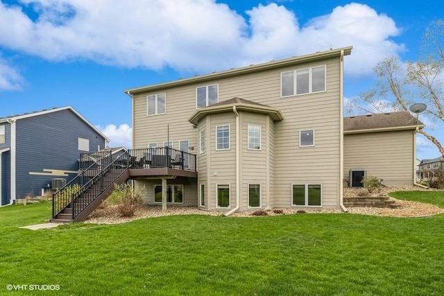 back of house with stairway, a wooden deck, a yard, and central AC