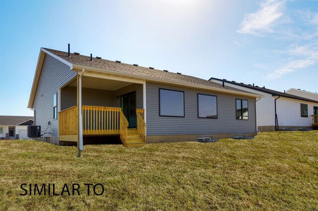 16514 Ironwood Ln, Urbandale, IA 50323 - rear view of house featuring cooling unit and a lawn