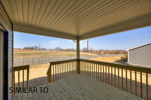 16514 Ironwood Ln, Urbandale, IA 50323 - deck with a fenced backyard and a view of rural / pastoral area