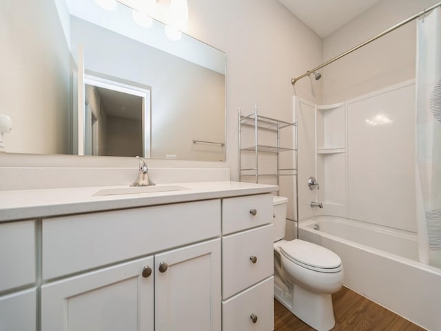 455 SW 12th St, Des Moines, IA 50309 - bathroom featuring wood finished floors, toilet, vanity, and shower / tub combo with curtain