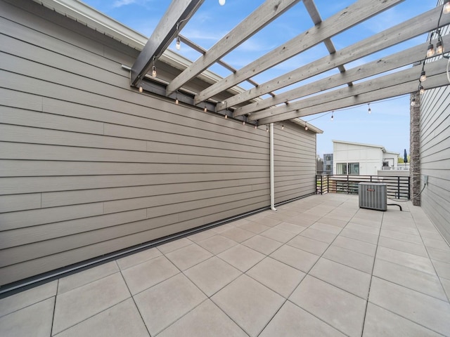 455 SW 12th St, Des Moines, IA 50309 - view of patio featuring cooling unit, a pergola, and a balcony