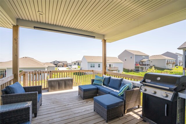 wooden deck with a residential view, area for grilling, and an outdoor living space