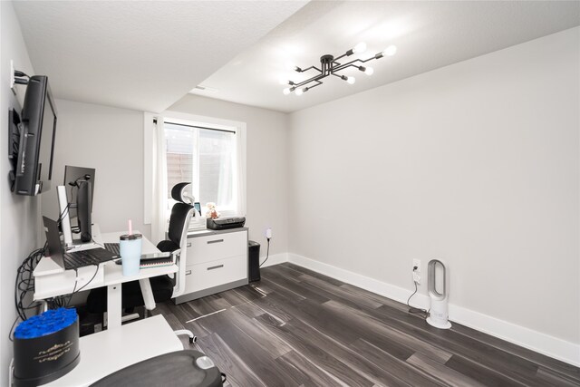home office with baseboards and dark wood-style flooring