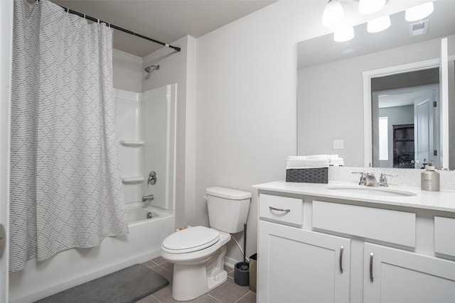 2802 SW Prairie Trail Pkwy, Ankeny, IA 50023 - full bath with tile patterned flooring, shower / bathtub combination with curtain, visible vents, toilet, and vanity