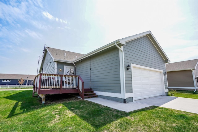 2802 SW Prairie Trail Pkwy, Ankeny, IA 50023 - exterior space with a yard, fence, concrete driveway, and a deck