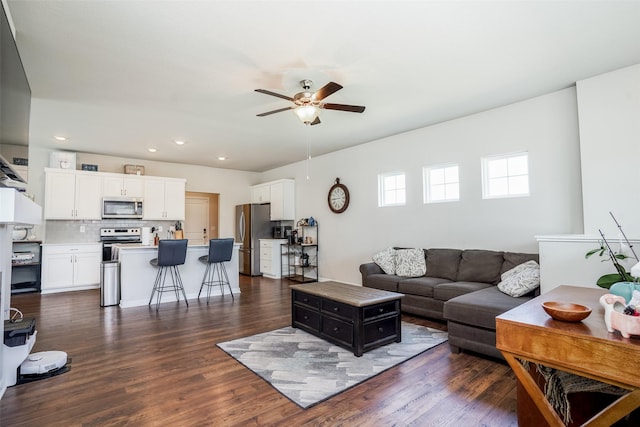 2802 SW Prairie Trail Pkwy, Ankeny, IA 50023 - living area with recessed lighting, dark wood finished floors, and a ceiling fan