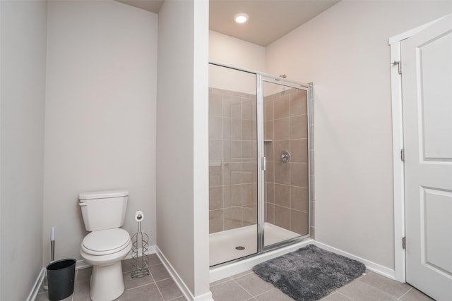 2802 SW Prairie Trail Pkwy, Ankeny, IA 50023 - full bath with toilet, tile patterned flooring, and a stall shower
