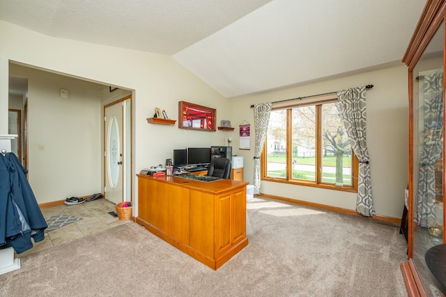 914 NE 9th St, Ankeny, IA 50021 - office space featuring light colored carpet, lofted ceiling, and baseboards