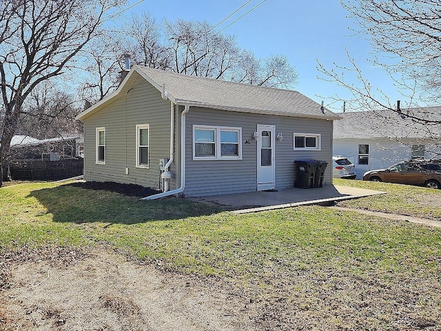 946 Miller Ave, Iowa City, IA 52246 - back of house with a patio and a yard