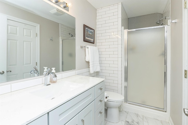 bathroom with a stall shower, visible vents, and marble finish floor