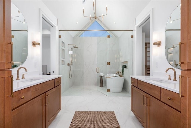18284 Baxter Pl, Clive, IA 50325 - full bathroom featuring a marble finish shower, marble finish flooring, vaulted ceiling, two vanities, and a freestanding bath