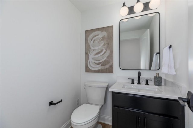 18284 Baxter Pl, Clive, IA 50325 - half bathroom featuring vanity, toilet, and baseboards