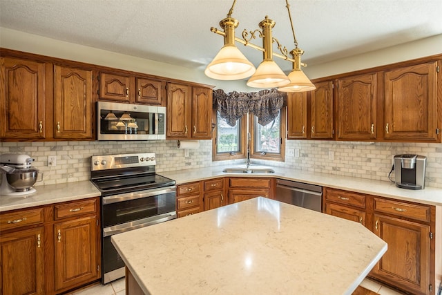 kitchen featuring tasteful backsplash, stainless steel appliances, and a center island