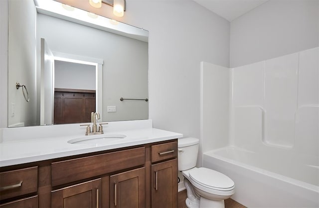 full bathroom with vanity and toilet