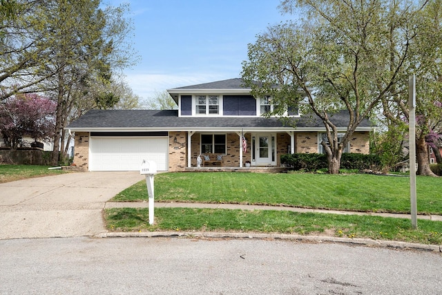 traditional-style house featuring driveway, brick siding, a porch, a front lawn, and a garage