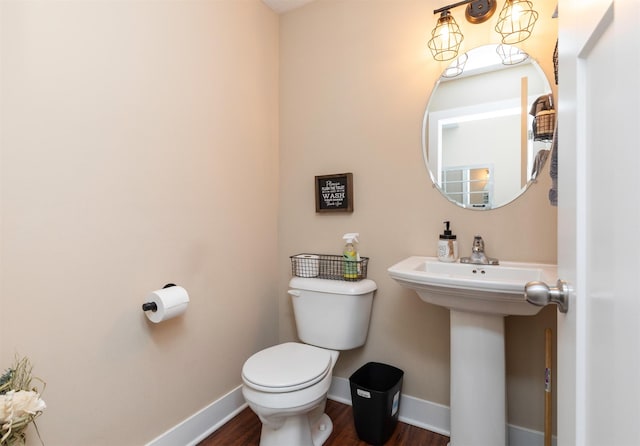 2884 Park Pl, Norwalk, IA 50211 - bathroom featuring toilet and wood finished floors