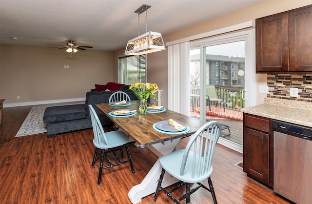 2884 Park Pl, Norwalk, IA 50211 - dining area featuring ceiling fan and dark wood finished floors