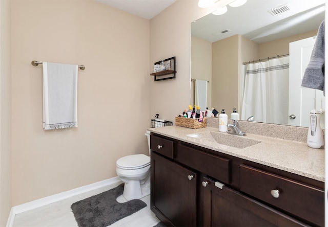2884 Park Pl, Norwalk, IA 50211 - full bath with vanity, toilet, baseboards, tile patterned flooring, and curtained shower