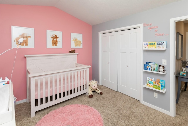2884 Park Pl, Norwalk, IA 50211 - bedroom with carpet flooring, lofted ceiling, a closet, and a nursery area