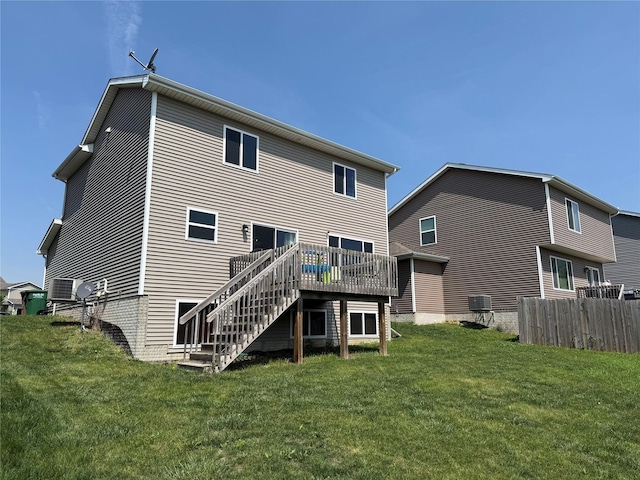 2884 Park Pl, Norwalk, IA 50211 - rear view of house with stairs and a wooden deck