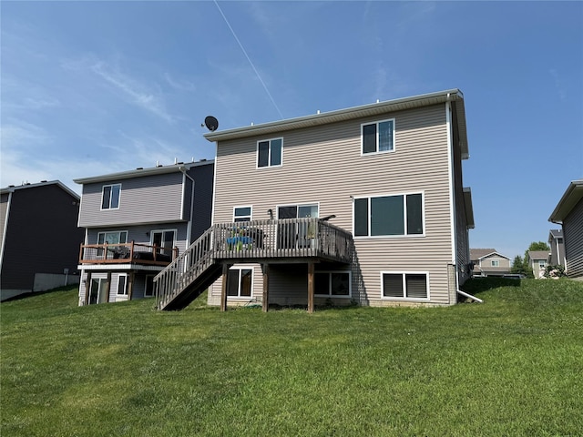 2884 Park Pl, Norwalk, IA 50211 - back of property with a wooden deck, a yard, and stairway