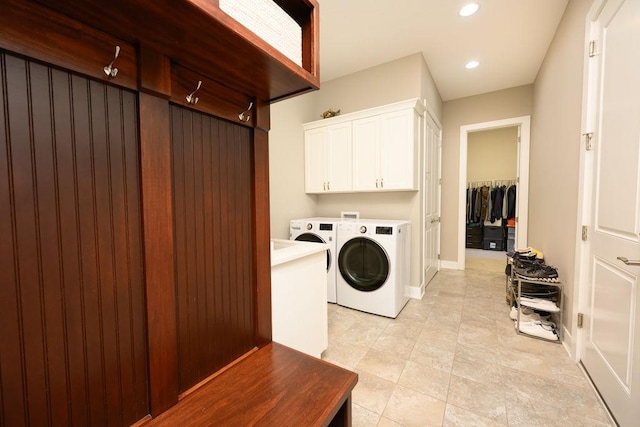 1616 Park Ave, Des Moines, IA 50315 - laundry area with cabinet space, separate washer and dryer, recessed lighting, and light tile patterned floors