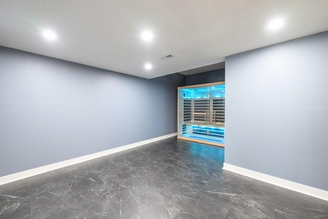 1616 Park Ave, Des Moines, IA 50315 - unfurnished room featuring baseboards, recessed lighting, visible vents, and marble finish floor